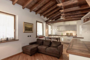 Sweet house at the old bridge of Lecco